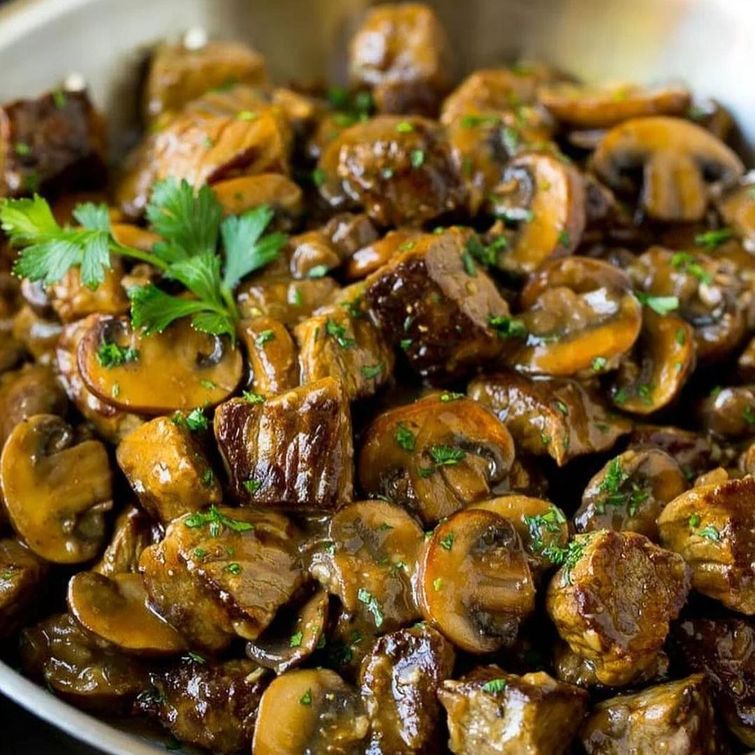 Golden brown beef tips in mushroom gravy