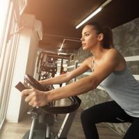 Woman on stationary bike