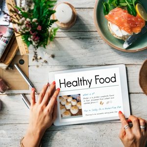 A delightful table setting showcasing a healthy meal, featuring fresh ingredients and a beautifully presented dish, perfect for food enthusiasts looking to explore healthier eating habits.