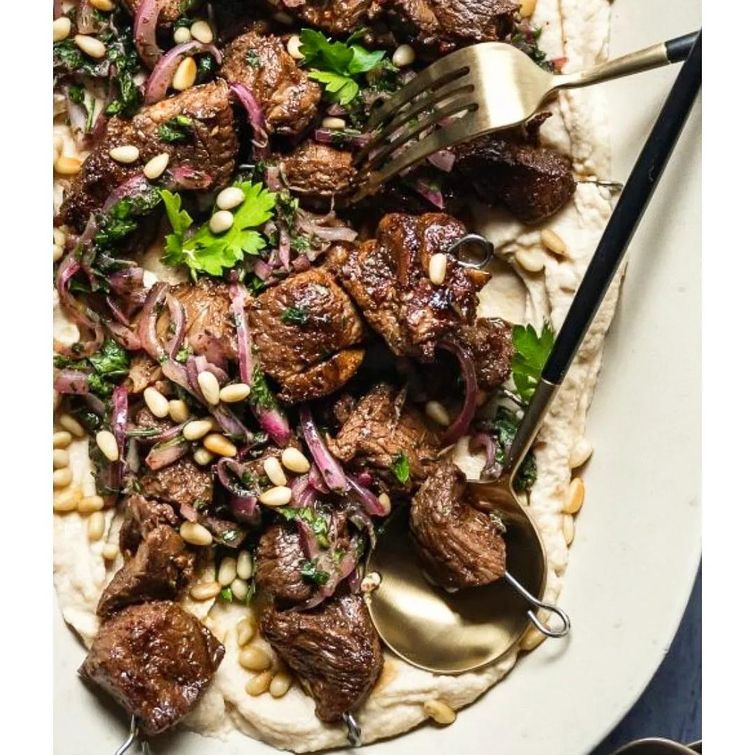 Lamb skewers marinated in pomegranate