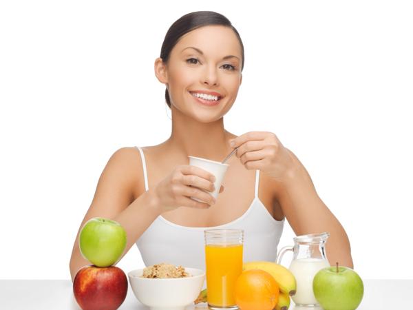 Woman eating healthy breakfast