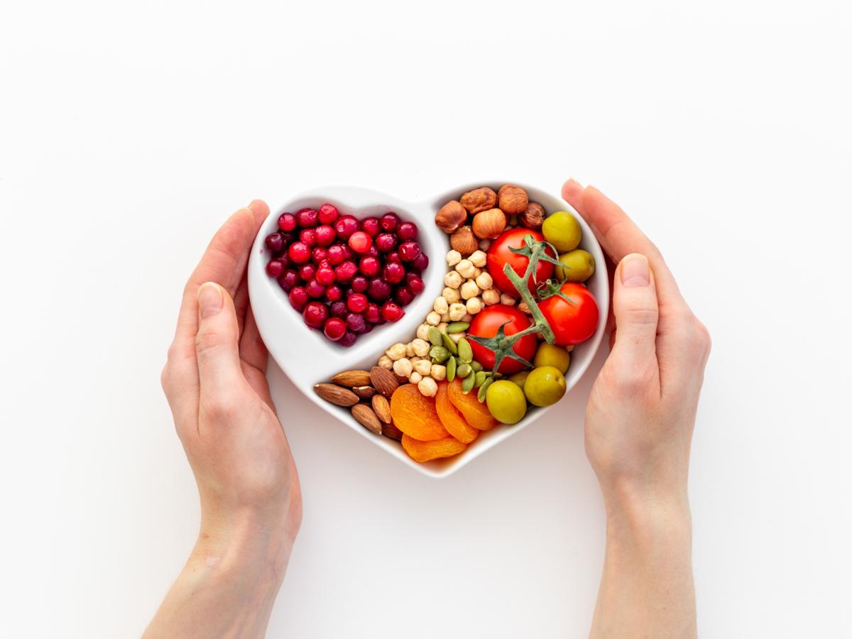 Heart-shaped bowl of healthy food