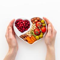 Heart-shaped bowl of healthy food