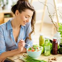 Woman eating healthy salad