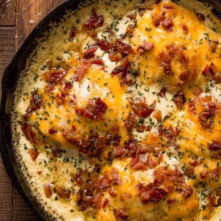 Keto crack chicken thighs with ranch sauce, cheddar, and bacon