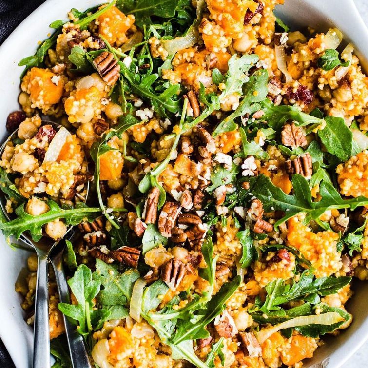 Vegan sweet potato salad with arugula and millet