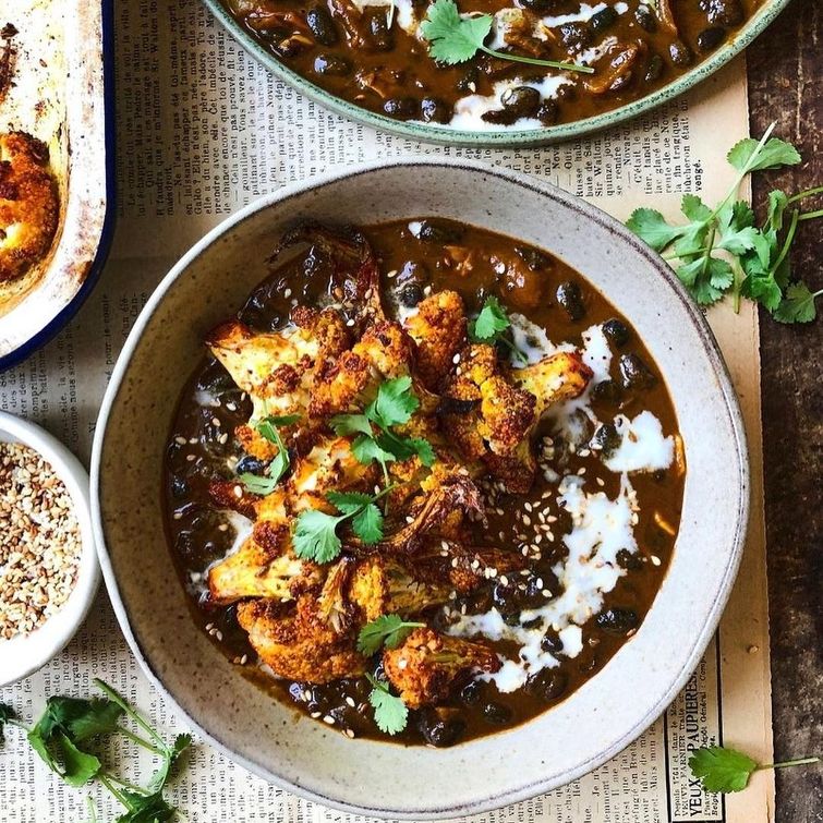 Delicious and healthy spiced black beans with golden roast turmeric cauliflower