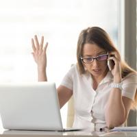 Angry businesswoman on phone