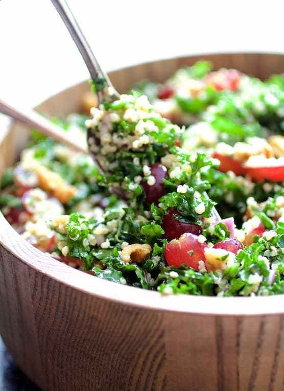 Quinoa And Kale Salad With Red Grapes Walnuts And Lemon Honey Dressing