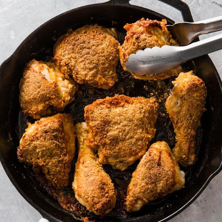 Oven-fried chicken in cast iron skillet