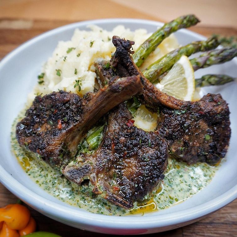 Delicious grilled lamb chops with herbs and mint sauce