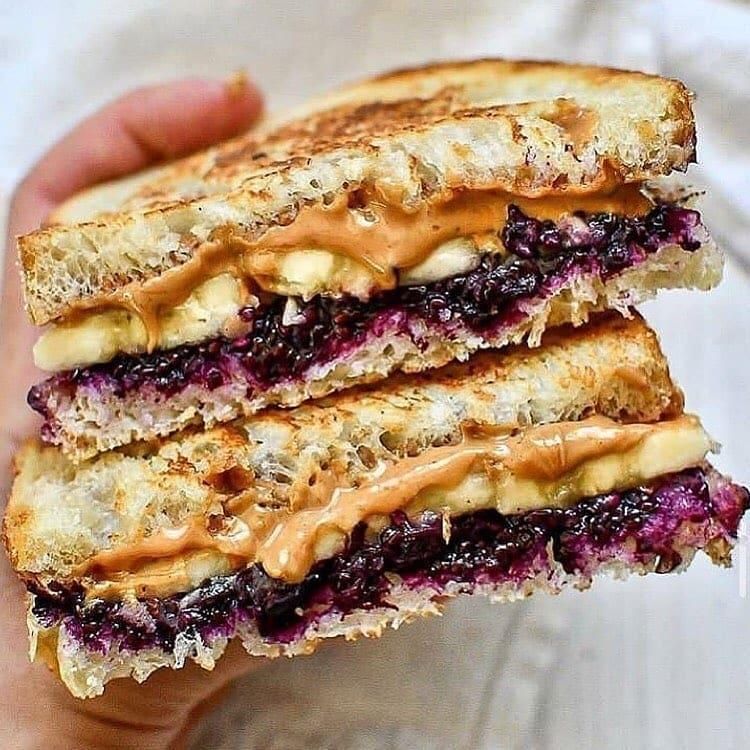 vegan peanut butter and blackberry jam sandwich