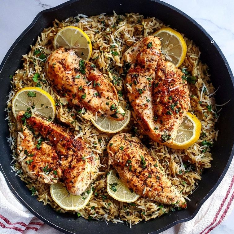 Lemon chicken and rice in a pan