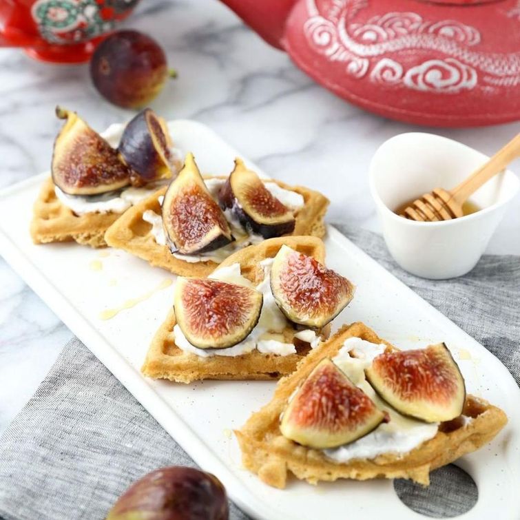 Waffles topped with figs and honey yogurt