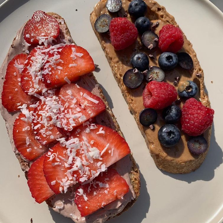 sourdough toast with peanut butter and mixed berries